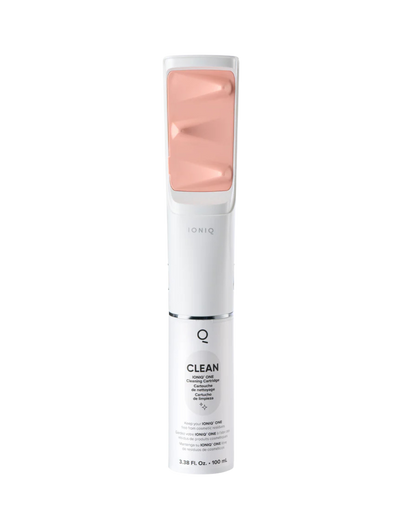 Self Tanner Ioniq device with pink top and white body on a white background