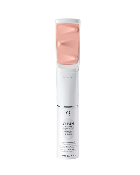 Self Tanner Ioniq device with pink top and white body on a white background